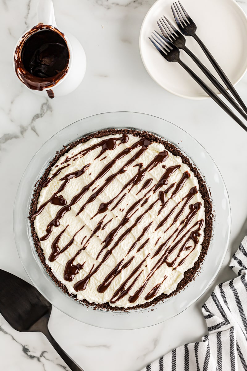 Overhead view of Chocolate Hazelnut Black-Bottom Pie in glass pie pan
