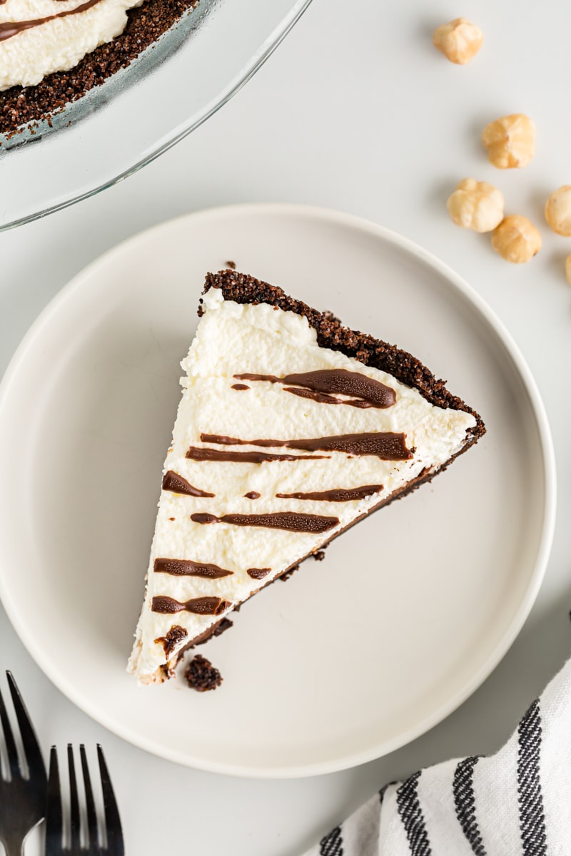 Overhead view of Chocolate Hazelnut Black-Bottom Pie slice on plate