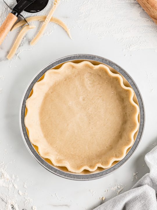 Three-in-One All-Butter Pie Dough  A perfect pie crust is no good if it's  burned. To avoid that risk, we bake the pie shell on a wire rack set in a  rimmed