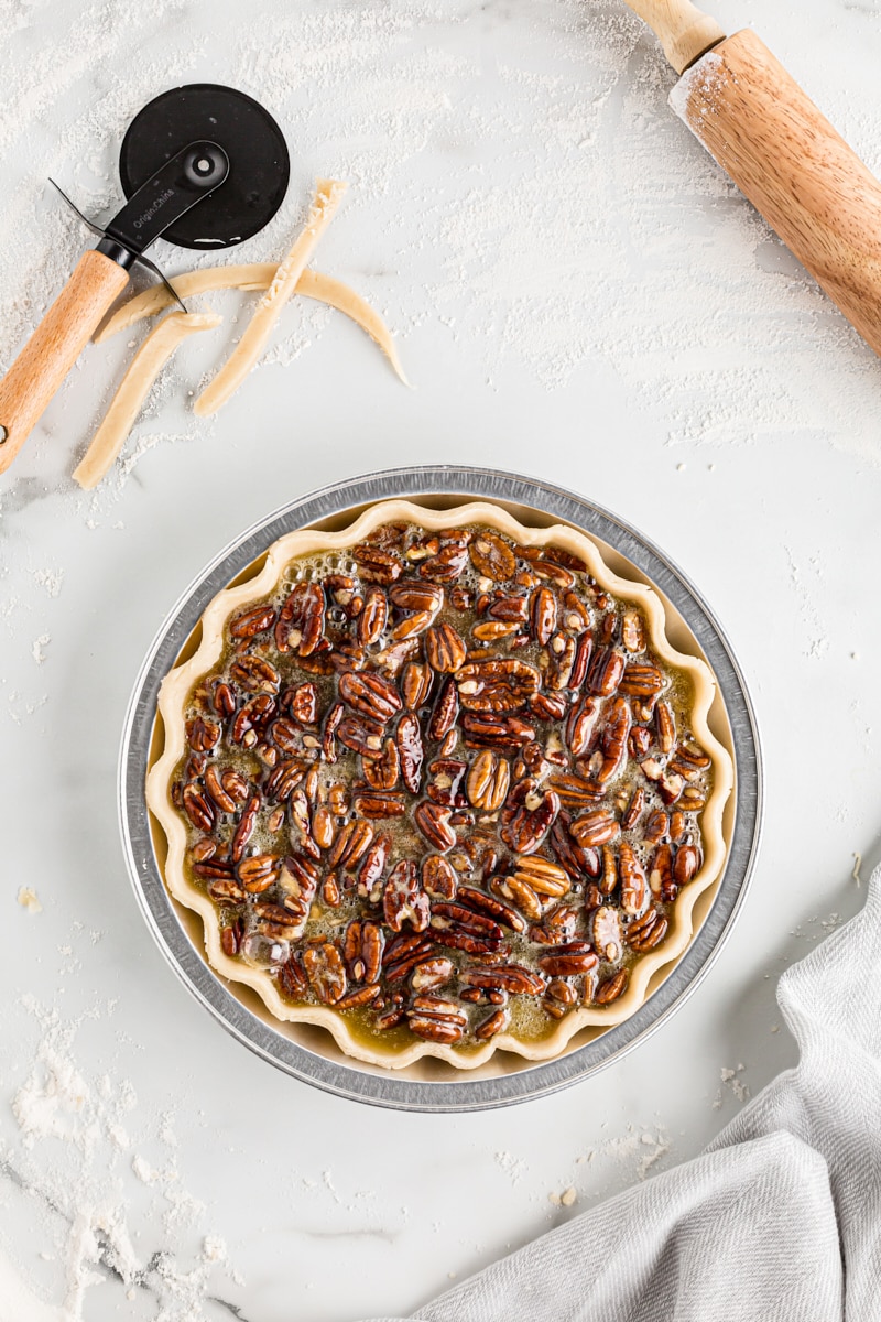 Overhead view of pecan pie before baking