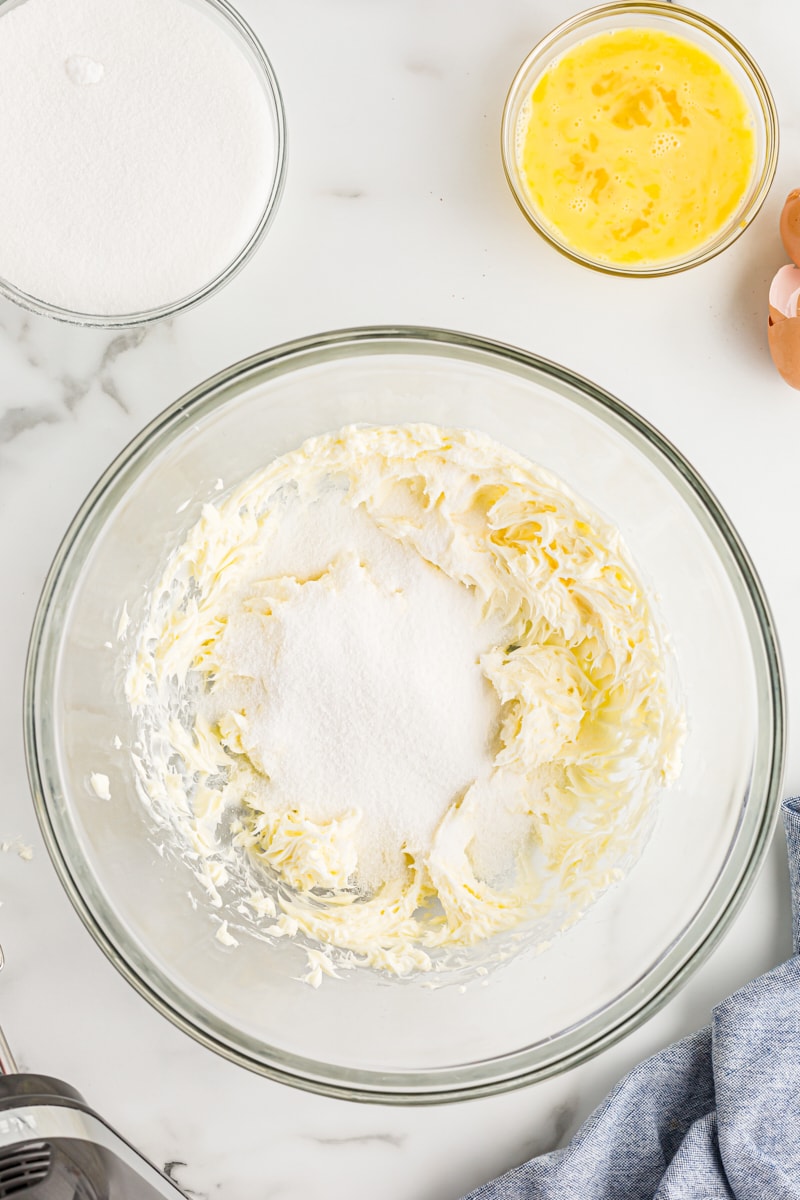 Sugar and butter in mixing bowl
