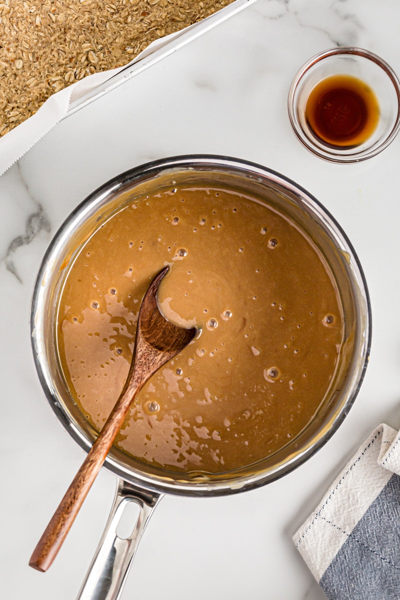 Caramel in saucepan with wooden spoon