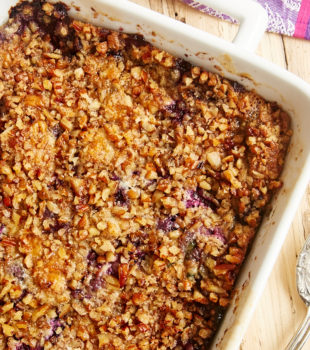 overhead view of Blueberry Pineapple Dump Cake in a white baking pan