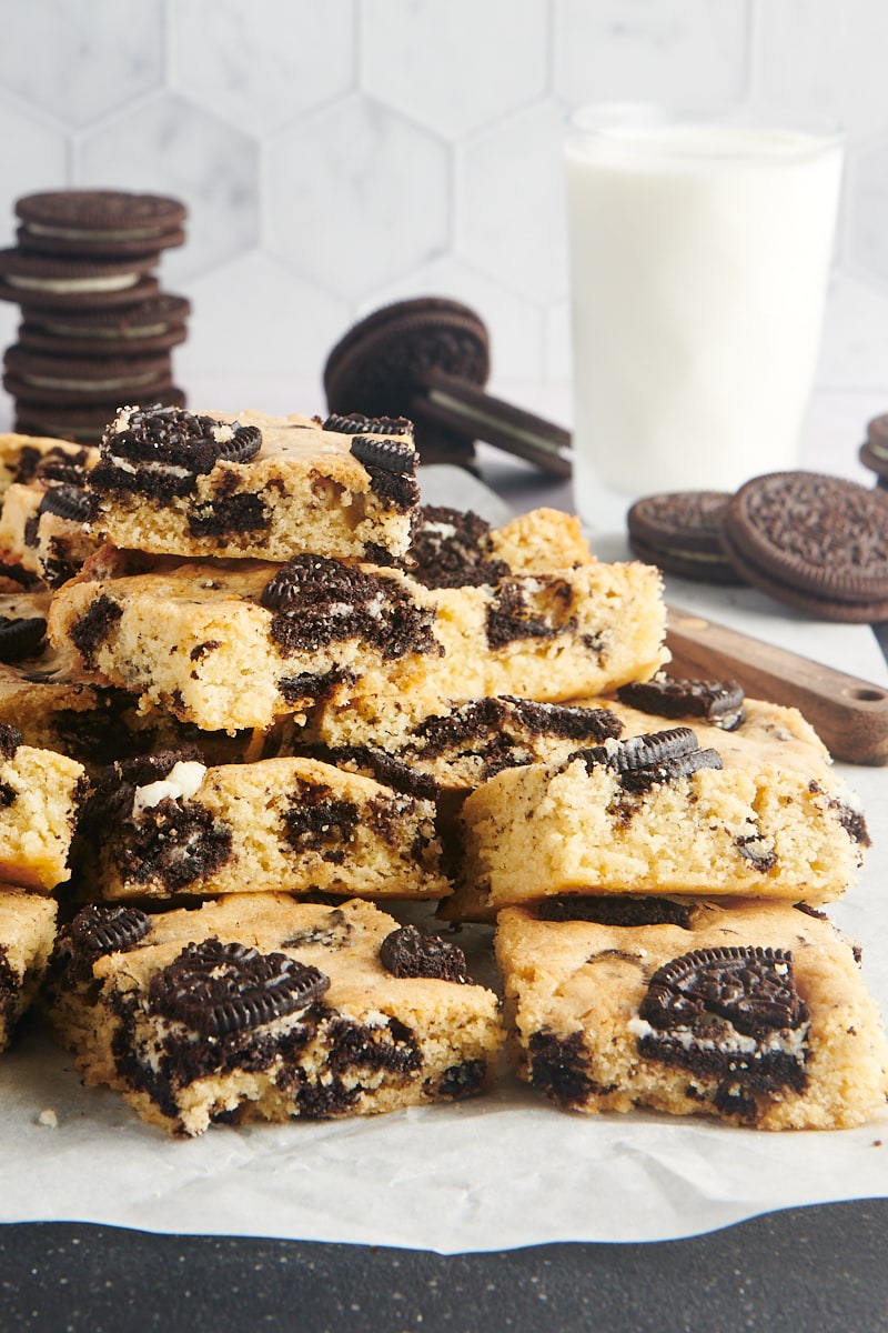 stacks of Cookies and Cream Blondies on parchment paper