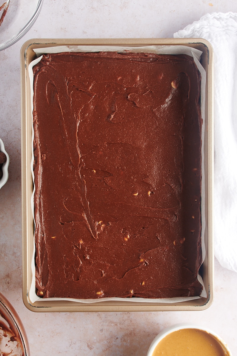 Overhead view of brownie batter in pan