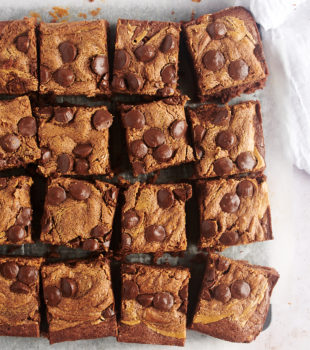 Overhead view of peanut butter brownies on parchment