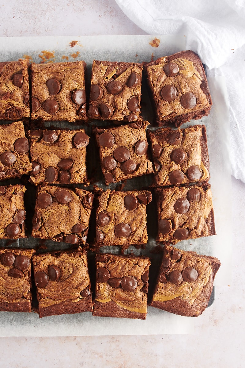 Overhead view of peanut butter brownies on parchment