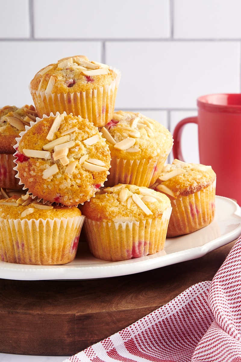 Red Currant Muffins piled on a white plate