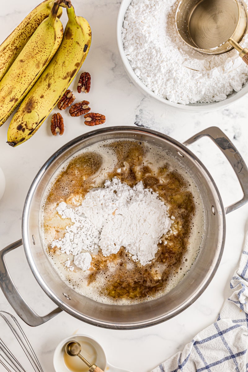 Overhead view of ingredients for browned butter icing in pan