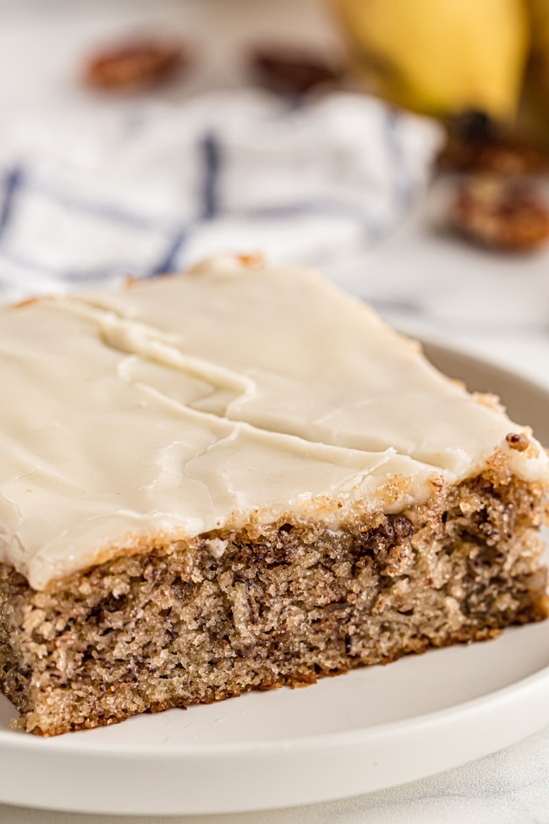 Banana bar with browned butter icing on plate