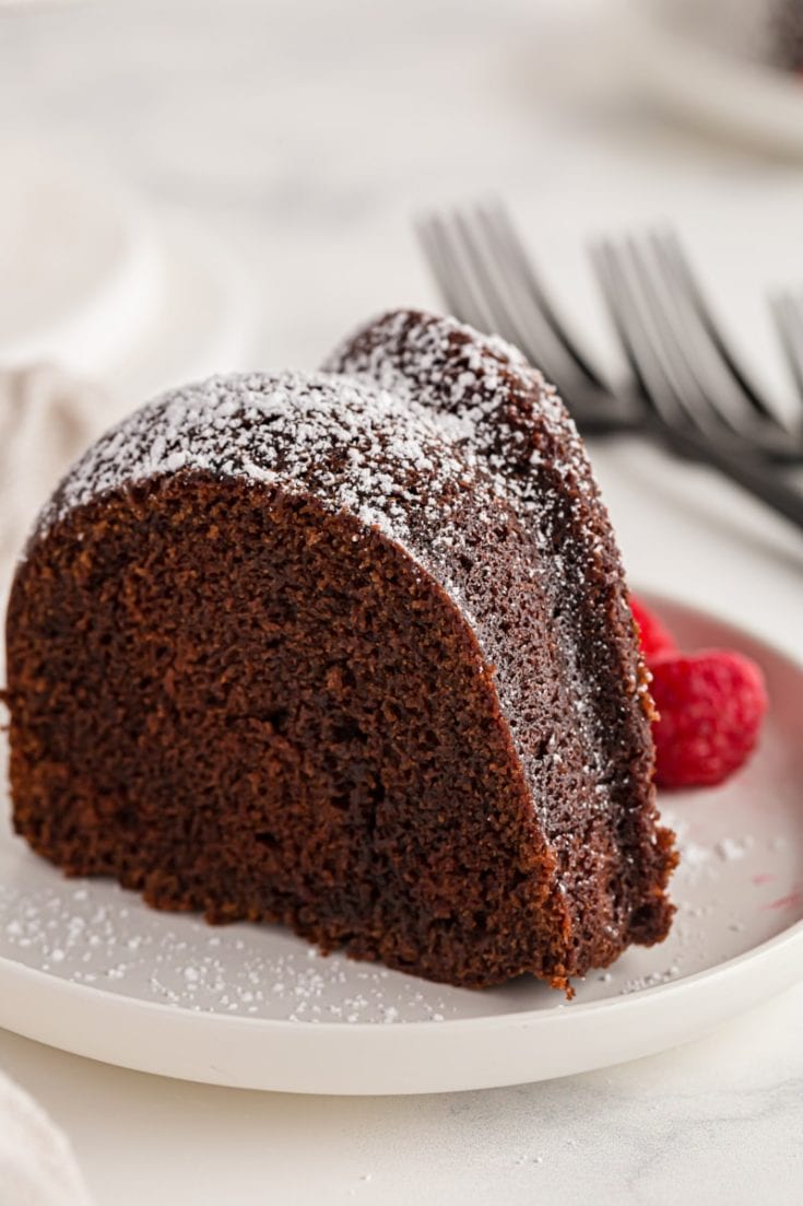 Slice of chocolate amaretto bundt cake on plate