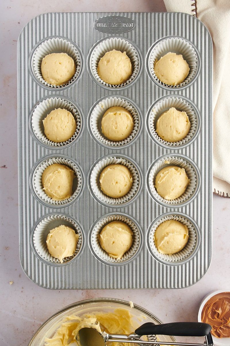 Overhead view of cupcake batter in pan