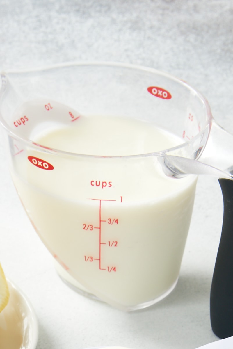 milk measured in a liquid measuring cup