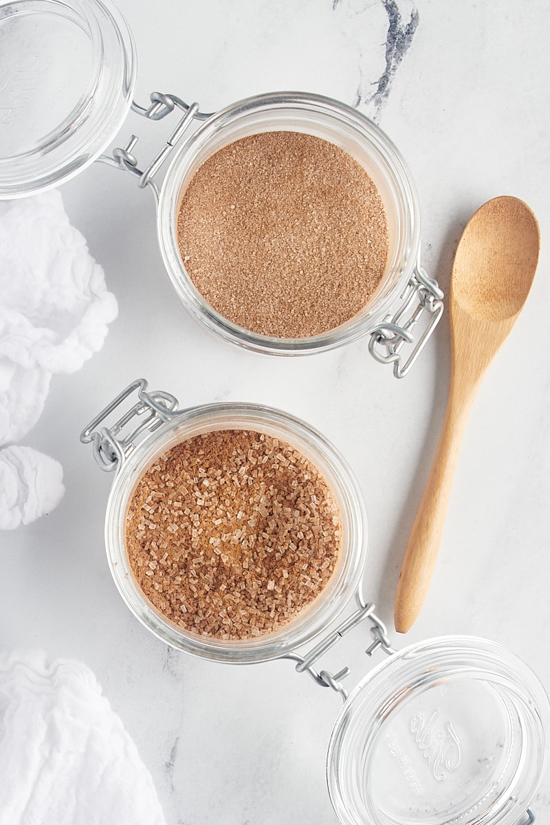 overhead view of two glass jars filled with cinnamon sugar