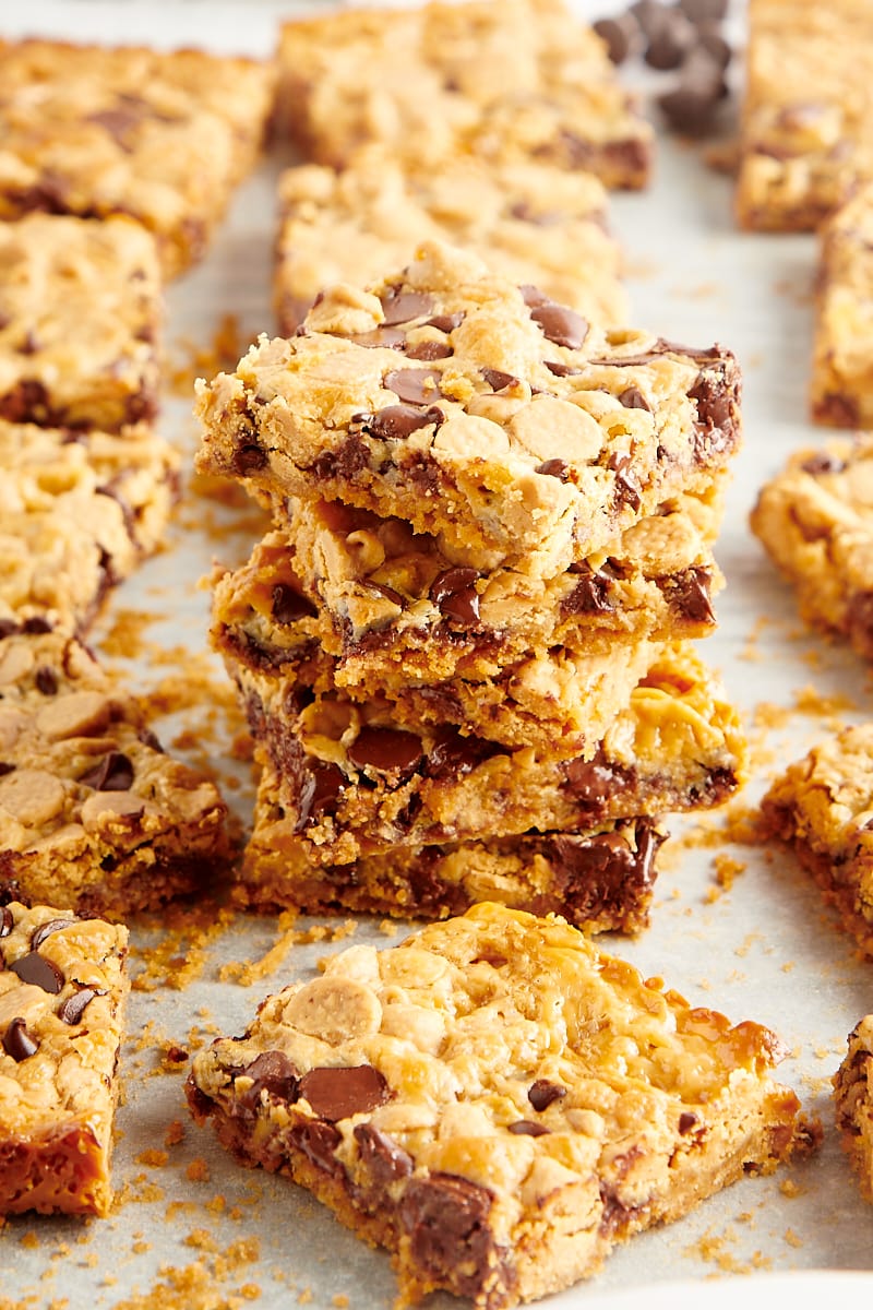 Stack of cookie bars on parchment paper