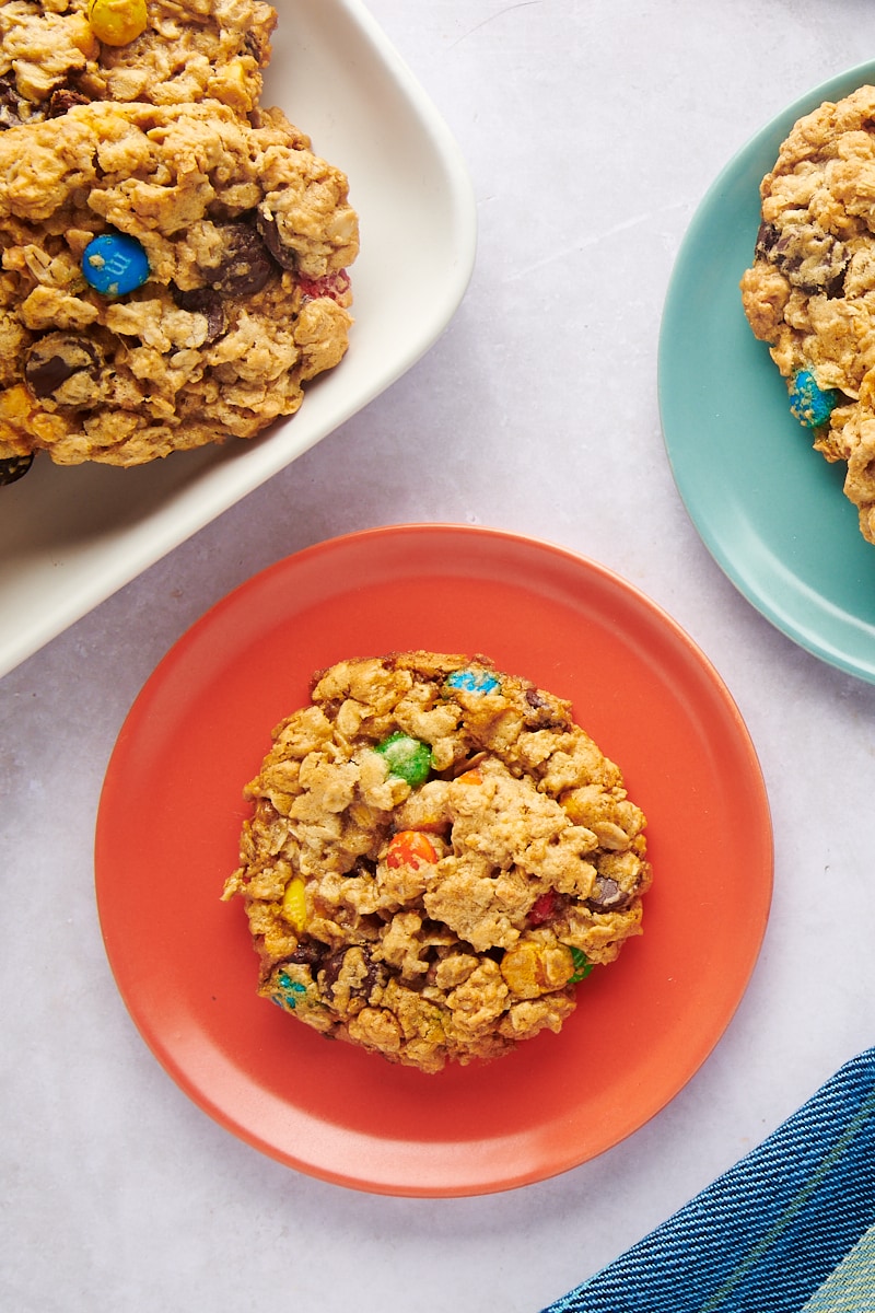 Overhead view of a monster cookie on a plate.