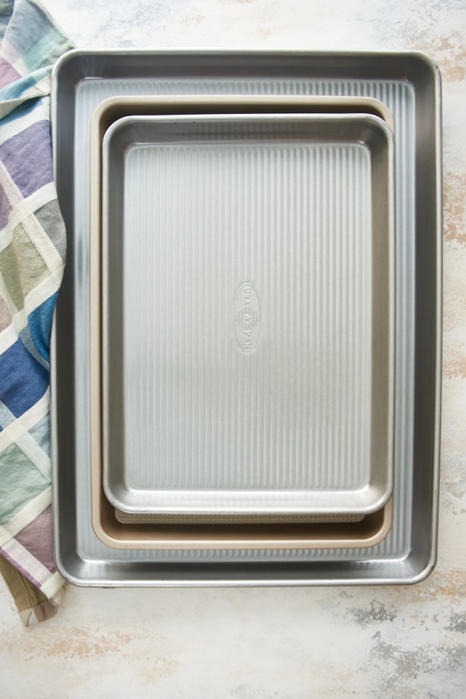 overhead view of three sheet pans stacked together