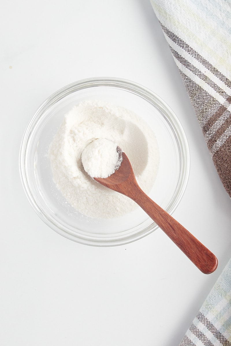 overhead view of vanilla powder in a white bowl