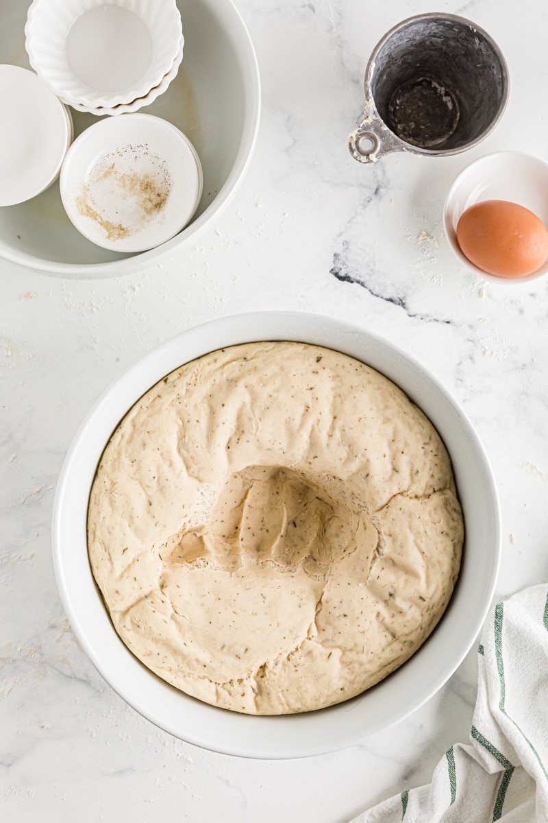 Dough being punched to get the air out.