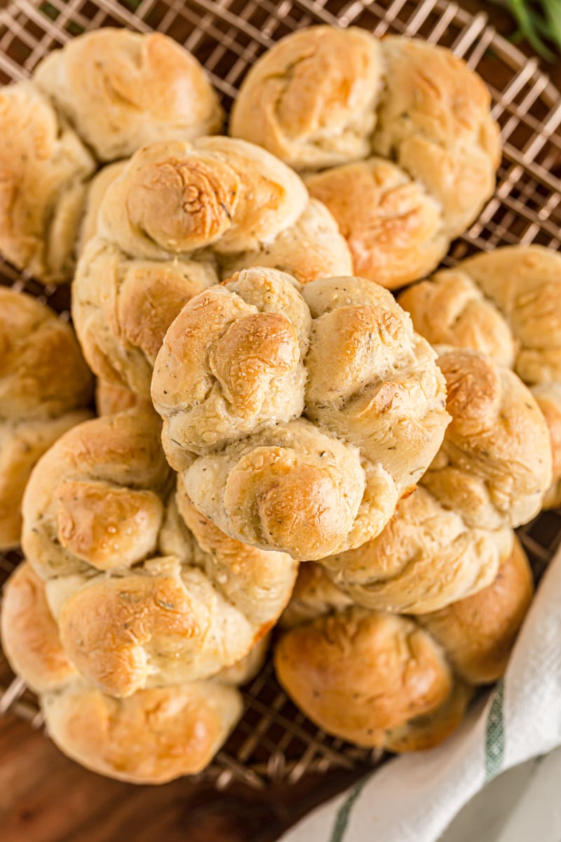 A pile of Herb Cloverleaf Rolls seen from above.