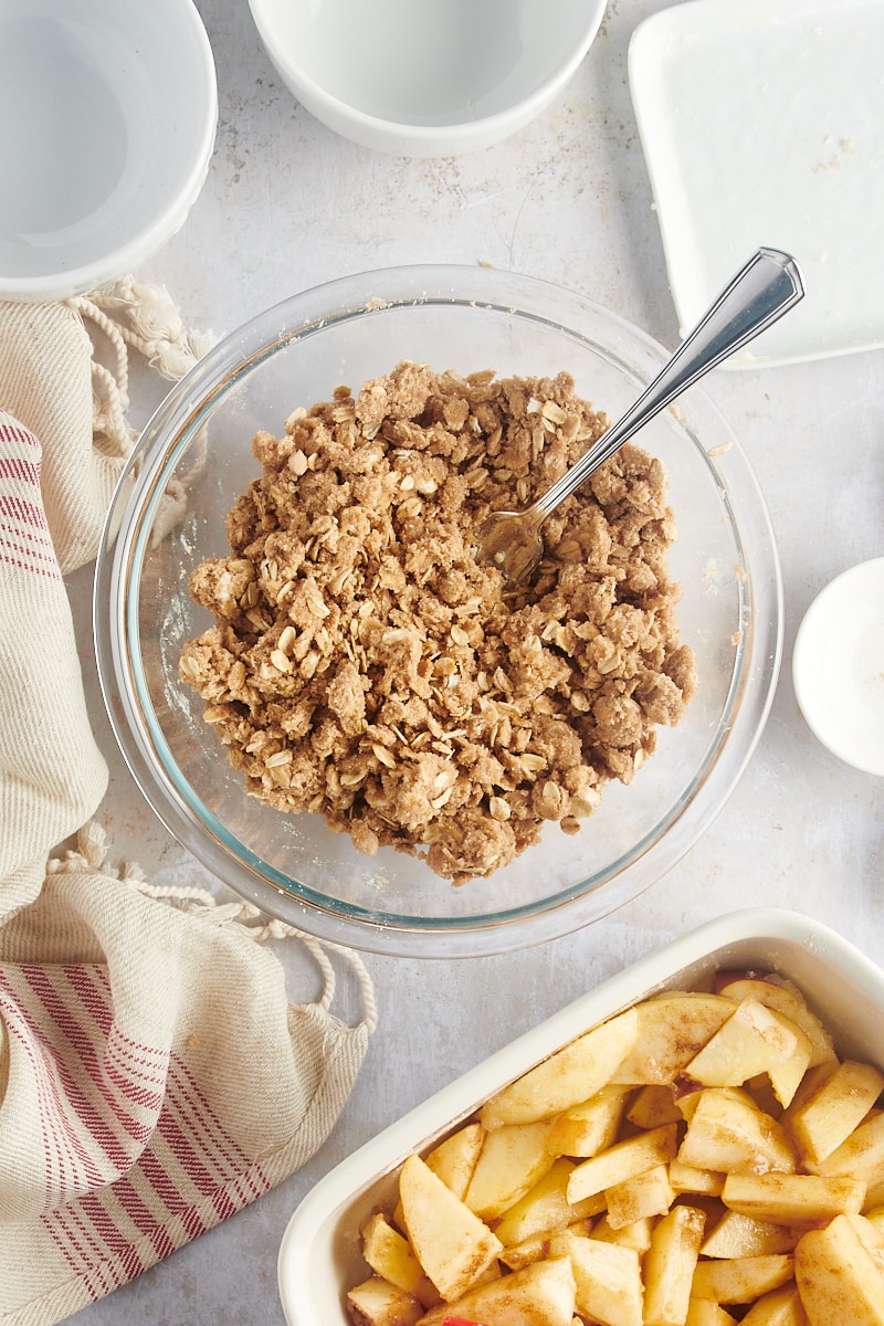 A spiced streusel topping with oats ready to be sprinkled over the apple filling.