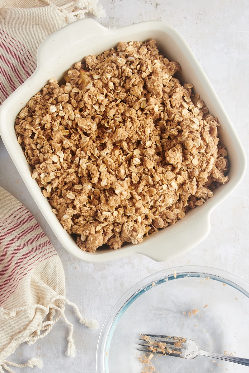 A spiced oat streusel topping over a layer of apples.