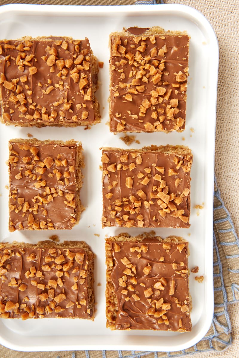 overhead view of Chocolate Toffee Bars on a white tray