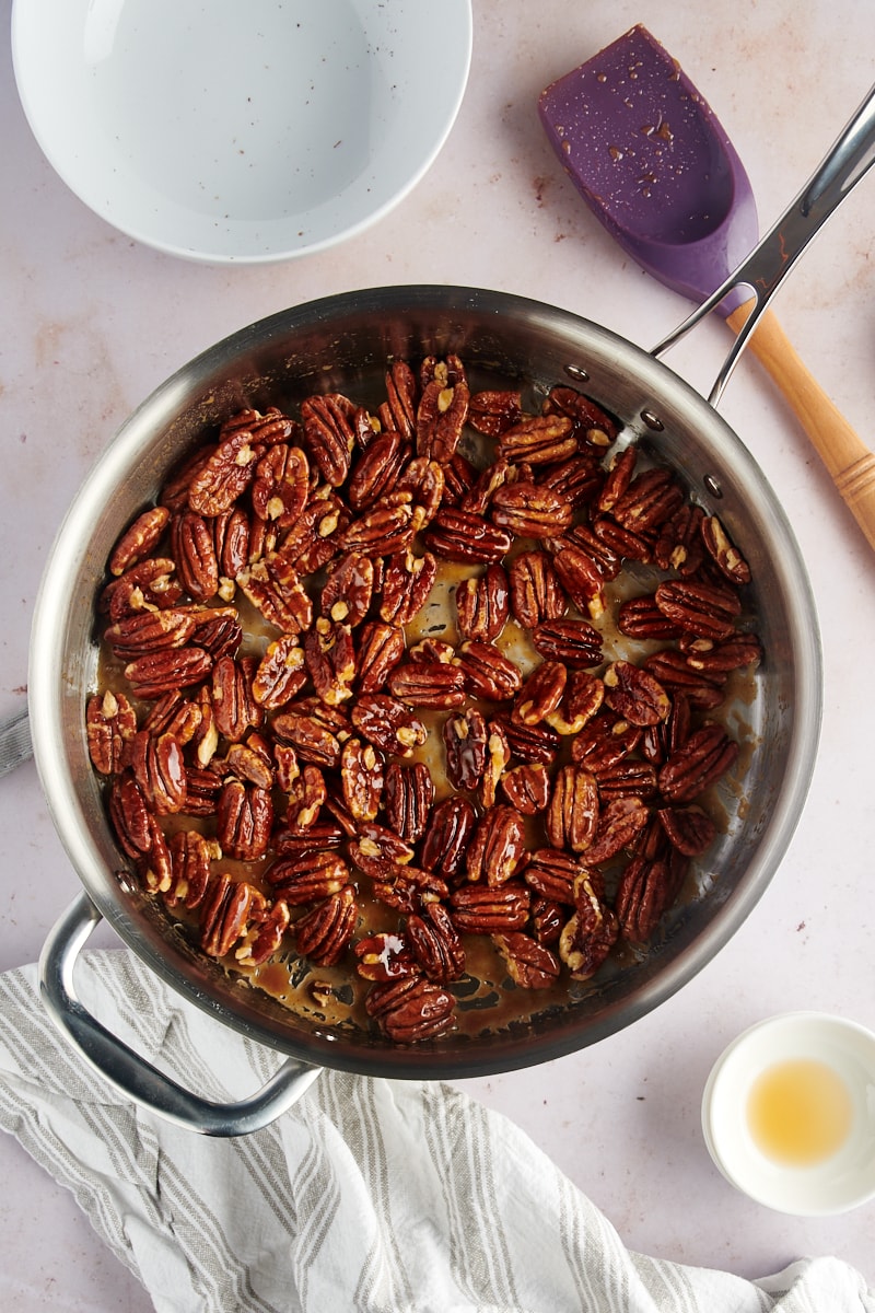 overhead view of Glazed Pecans mixture in a skillet