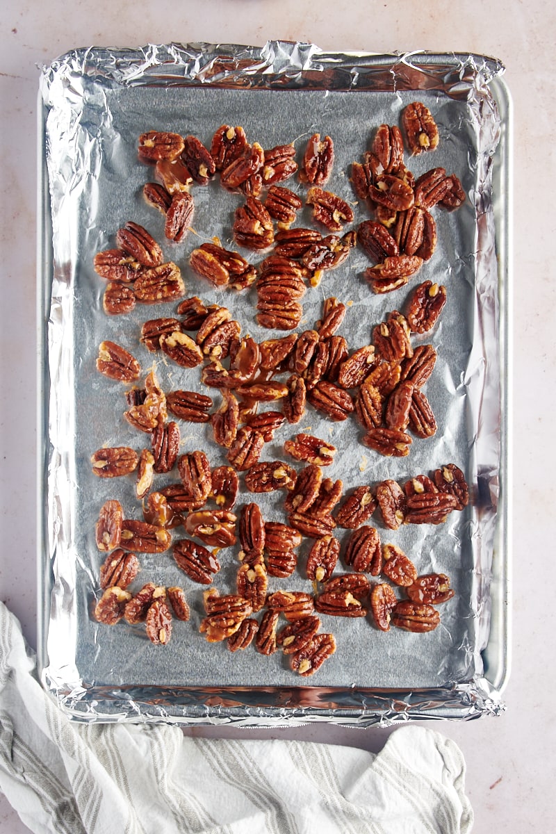 overhead view of Glazed Pecans on a baking sheet ready to go in the oven