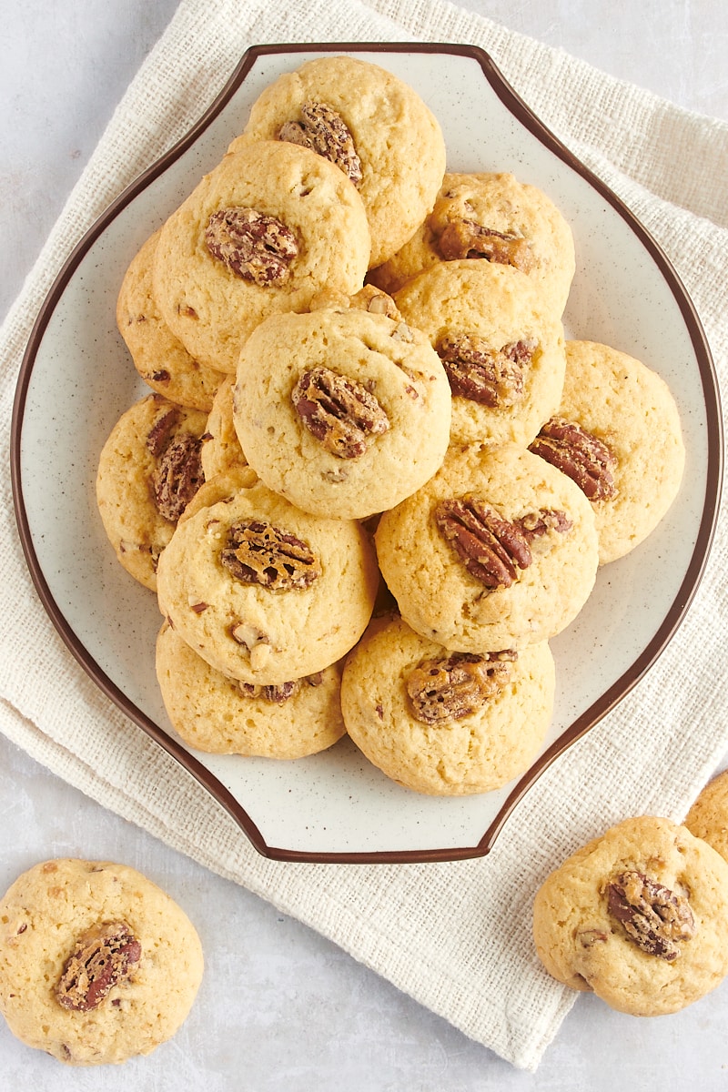 overhead view of Maple Pecan Cookies on a white and brown-speckled plate