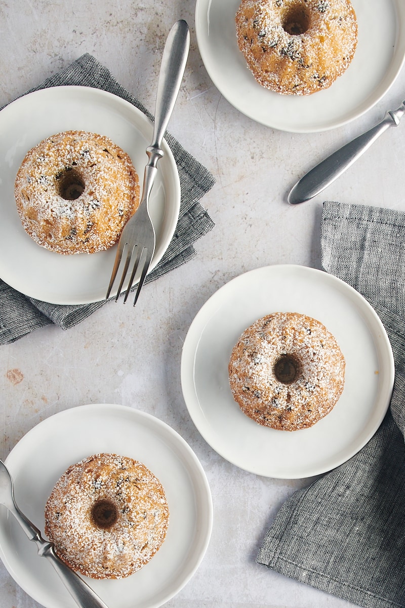 overhead view of Mini Chocolate Chip Bundt Cakes on white plates