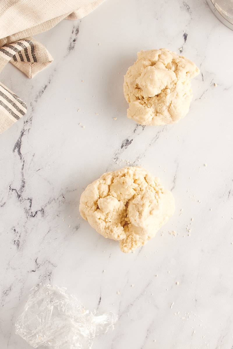 overhead view of pie crust dough divided into two portions