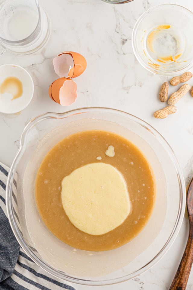 Adding egg, buttermilk and vanilla to cake batter