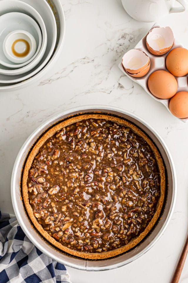 Pecan pie filling added to the cooked crust.