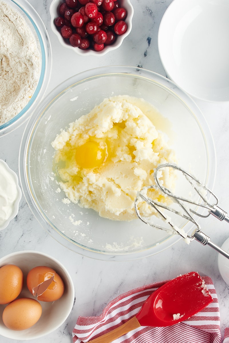 Adding eggs to the bundt cake batter