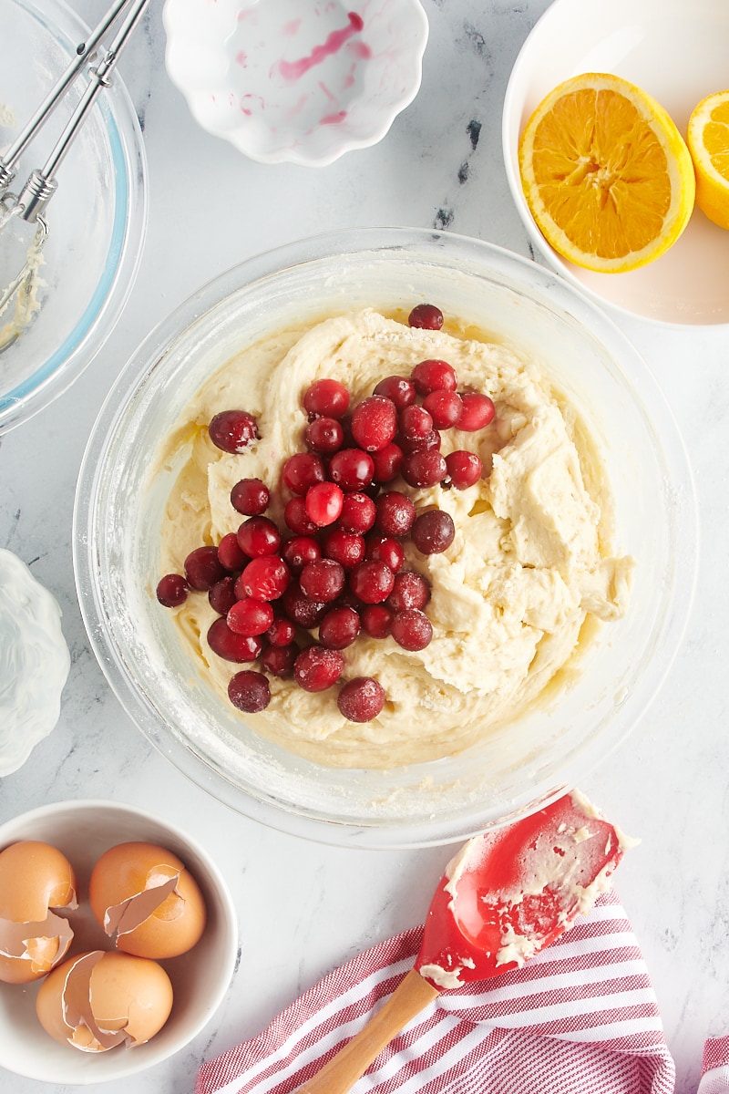 Adding cranberries to the batter