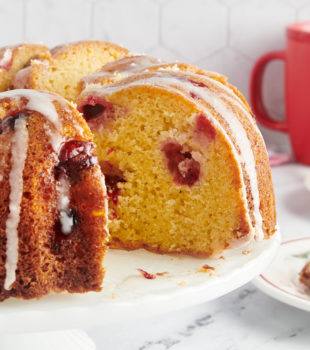 Cranberry bundt cake with a slice missing