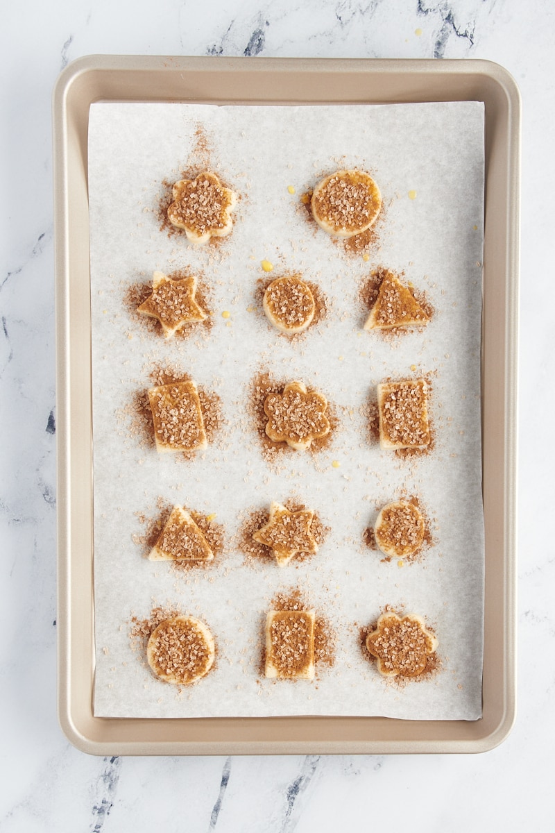 overhead view of Pie Crust Cookies on a parchment-lined sheet pan ready for the oven