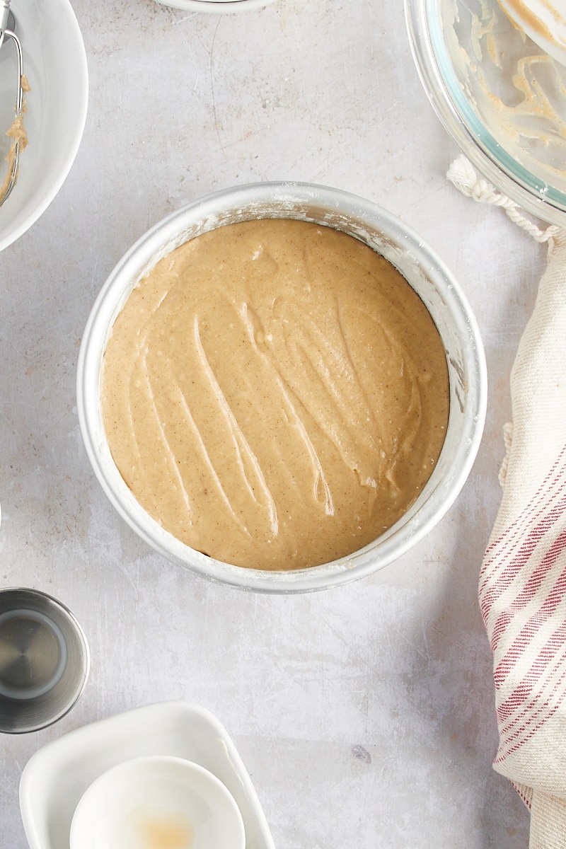 overhead view of spice cake batter in a small cake pan