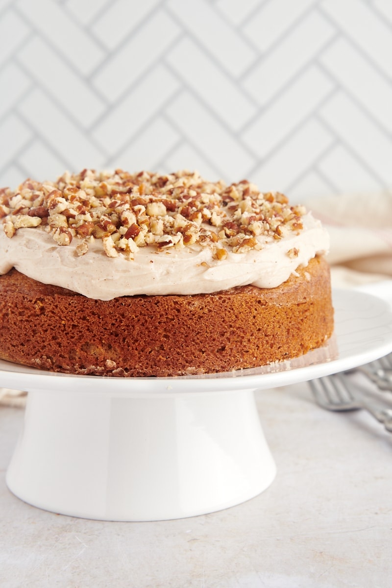 spice cake on a white cake stand