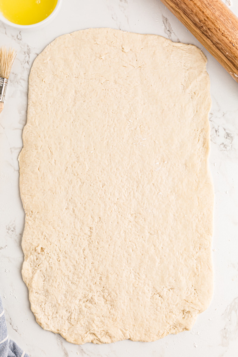 Rolling the biscuit dough into a rectangle