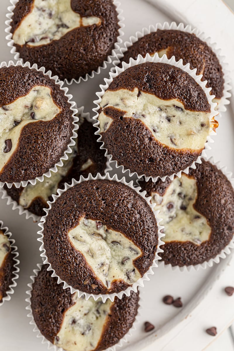 overhead view of Black Bottom Cupcakes piled on a white plate