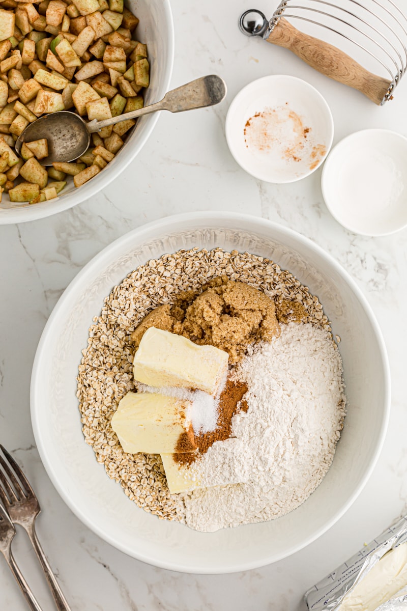 overhead view of streusel ingredients in a white mixing bowl