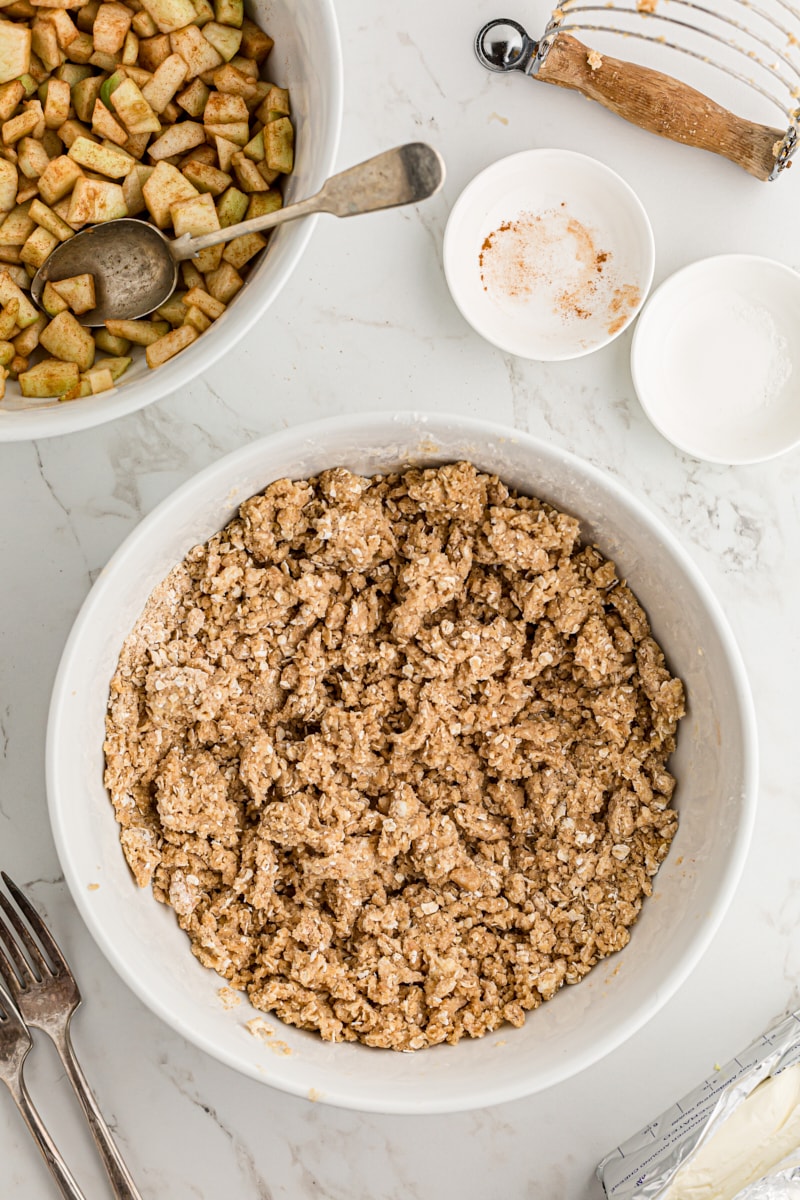 overhead view of mixed streusel topping in a white mixing bowl