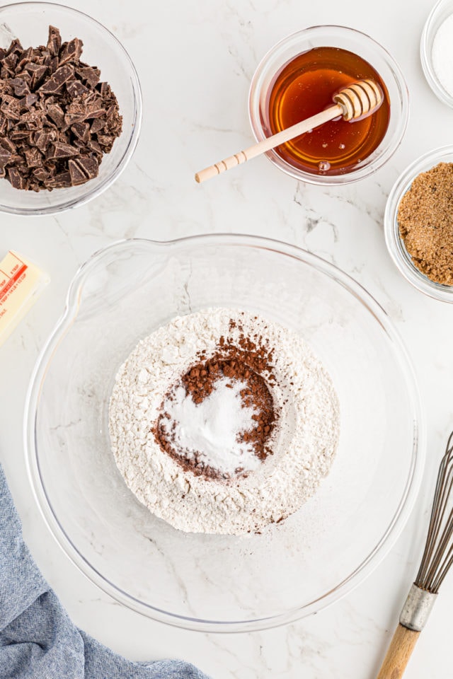 Overhead view of dry ingredients in mixing bowl before stirring