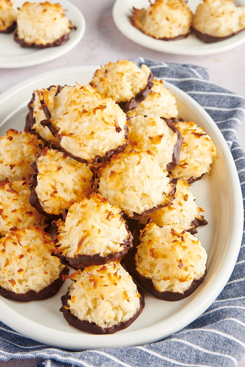 pile of Coconut Macaroons on an oval white plate