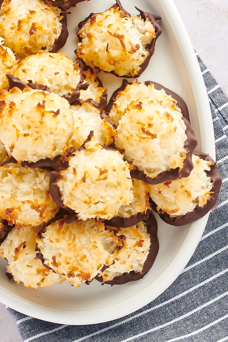 overhead view of Coconut Macaroons piled on a white serving plate