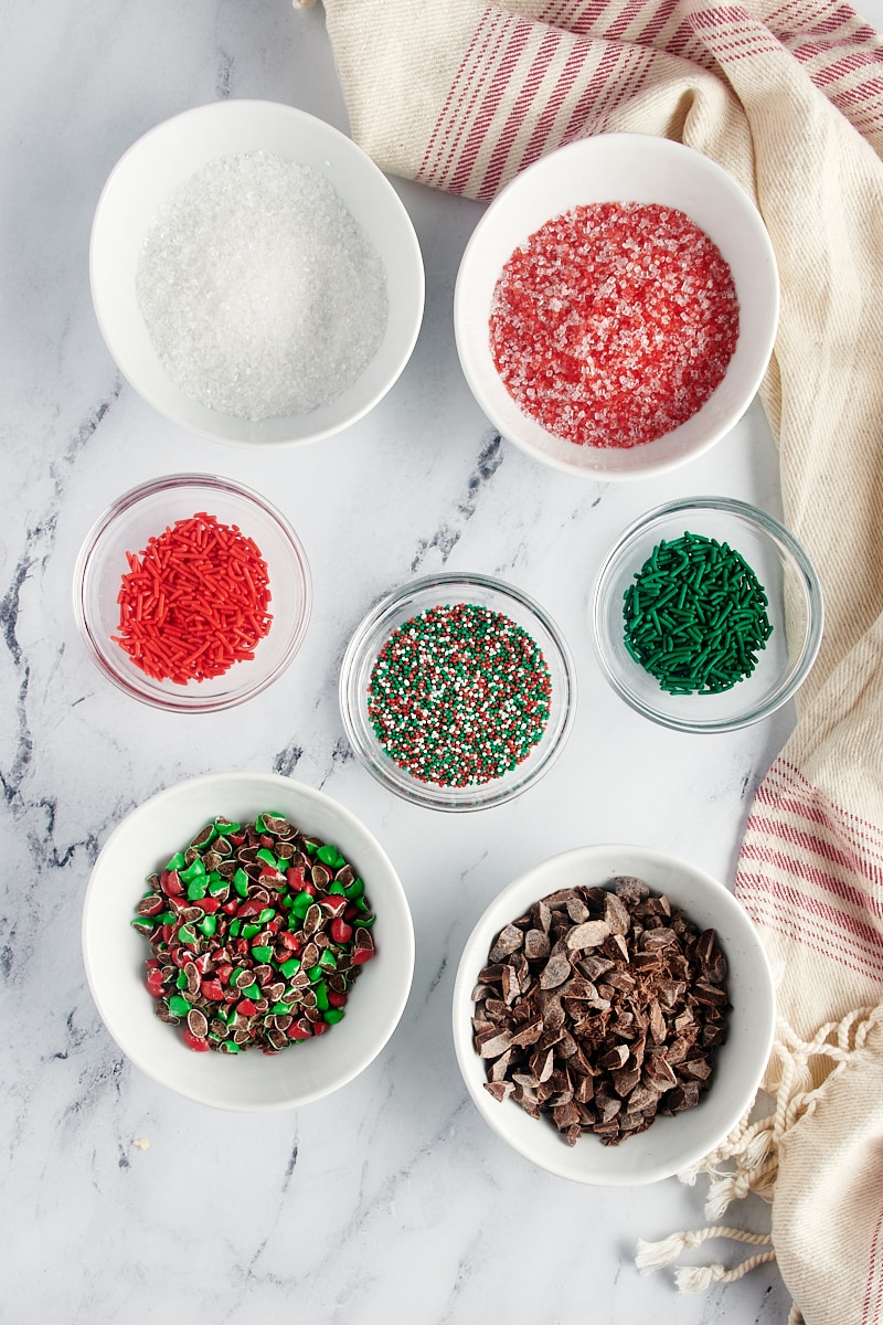 Overhead view of toppings for sugar cookies.