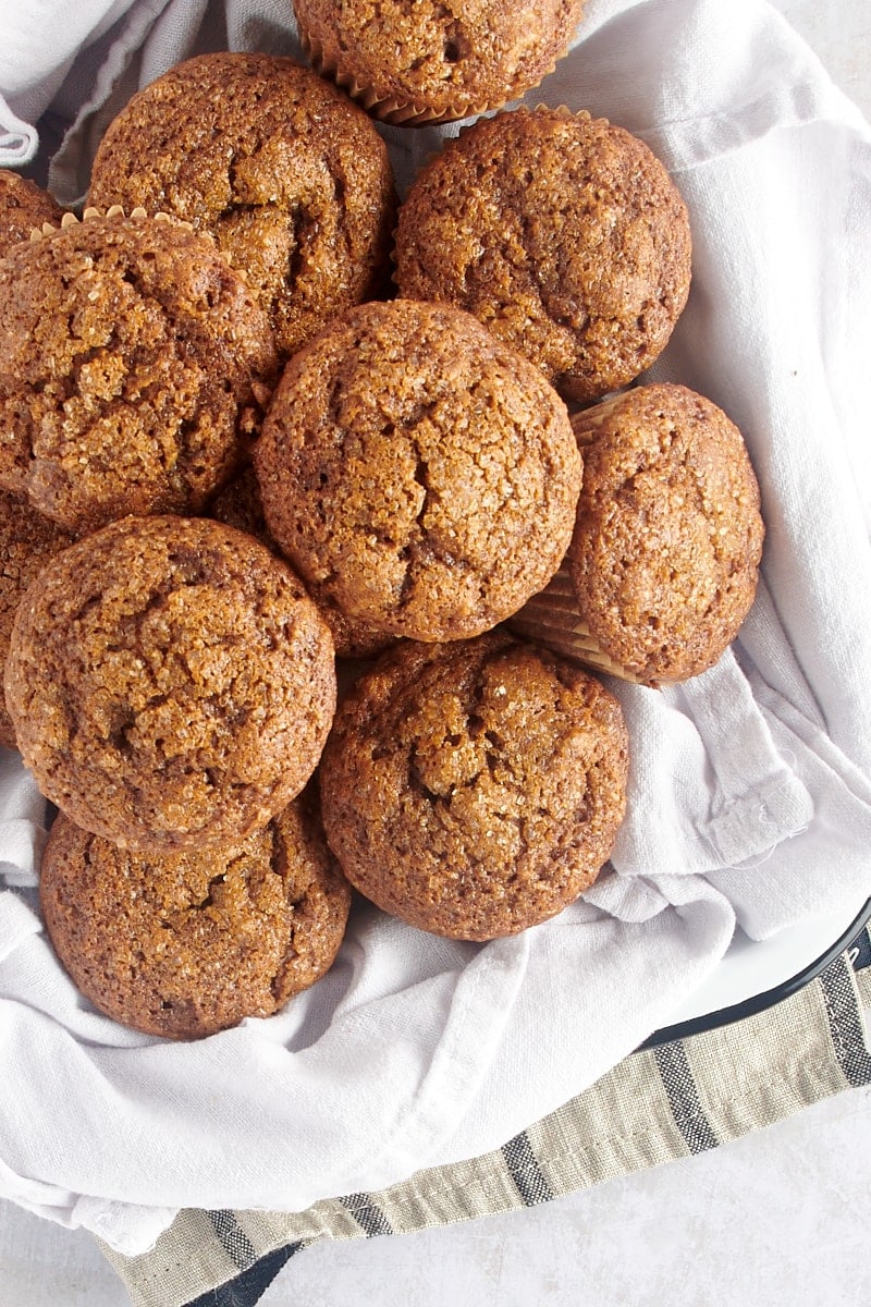 overhead view of Gingerbread Muffins in a towel-lined tray