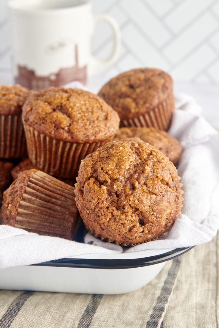Gingerbread Muffins in a towel-lined white tray